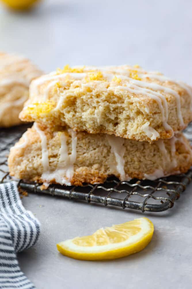 2 lemon scones stacked on top of each other.