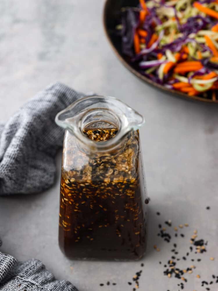 Top-down view of a bottle of Asian salad dressing.