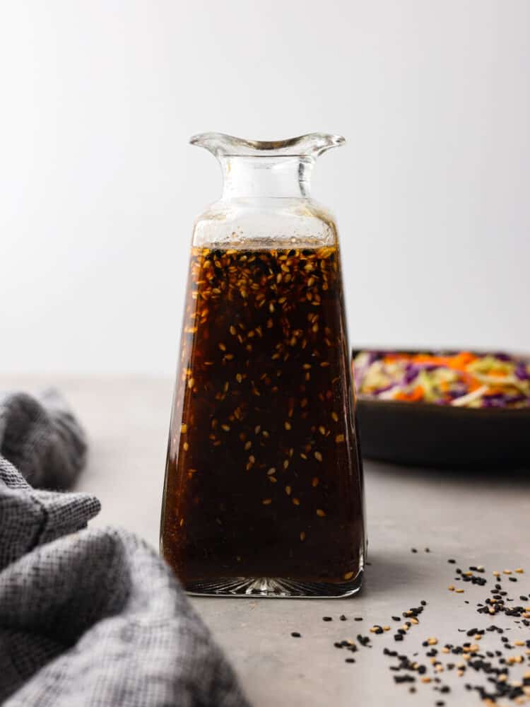 Hero image of Asian salad dressing in a glass jar.