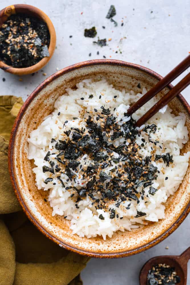 A bowl of rice topped with furikake.