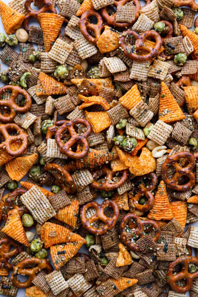 Top-down view of Furikake Chex mix made with a variety of cereals, chips, and pretzels.