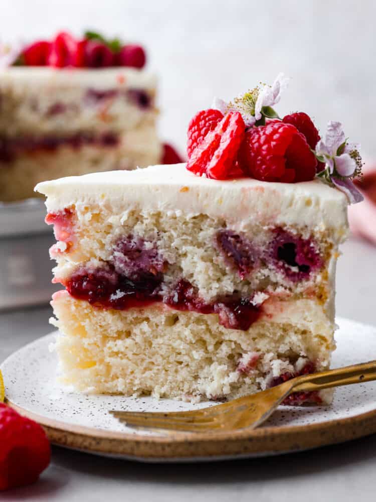 Closeup of a slice of lemon raspberry cake.