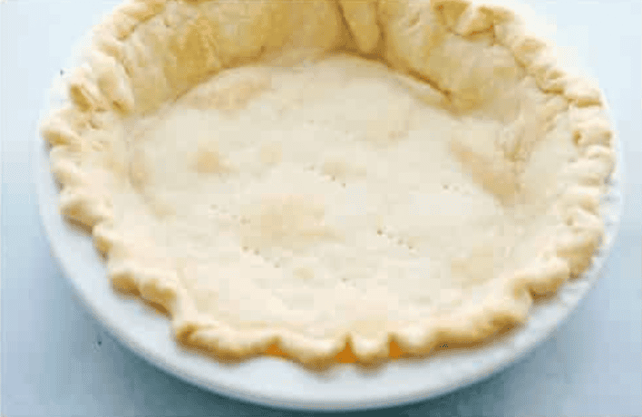 My fresh strawberry pie is one of those desserts that looks gorgeous but is so easy to make. A premade pie crust, juicy, fresh strawberries, and a quick homemade glaze come together to make a glossy, beautiful pie! Pie crust all baked and ready.