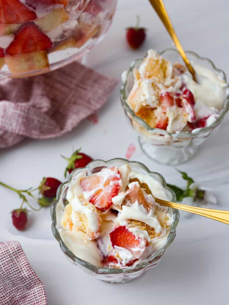 Strawberry trifle in 2 dessert serving dishes.