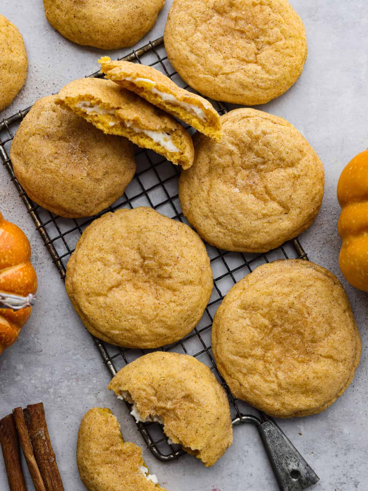 Pumpkin cheesecake snickerdoodles on a cooling rack. 