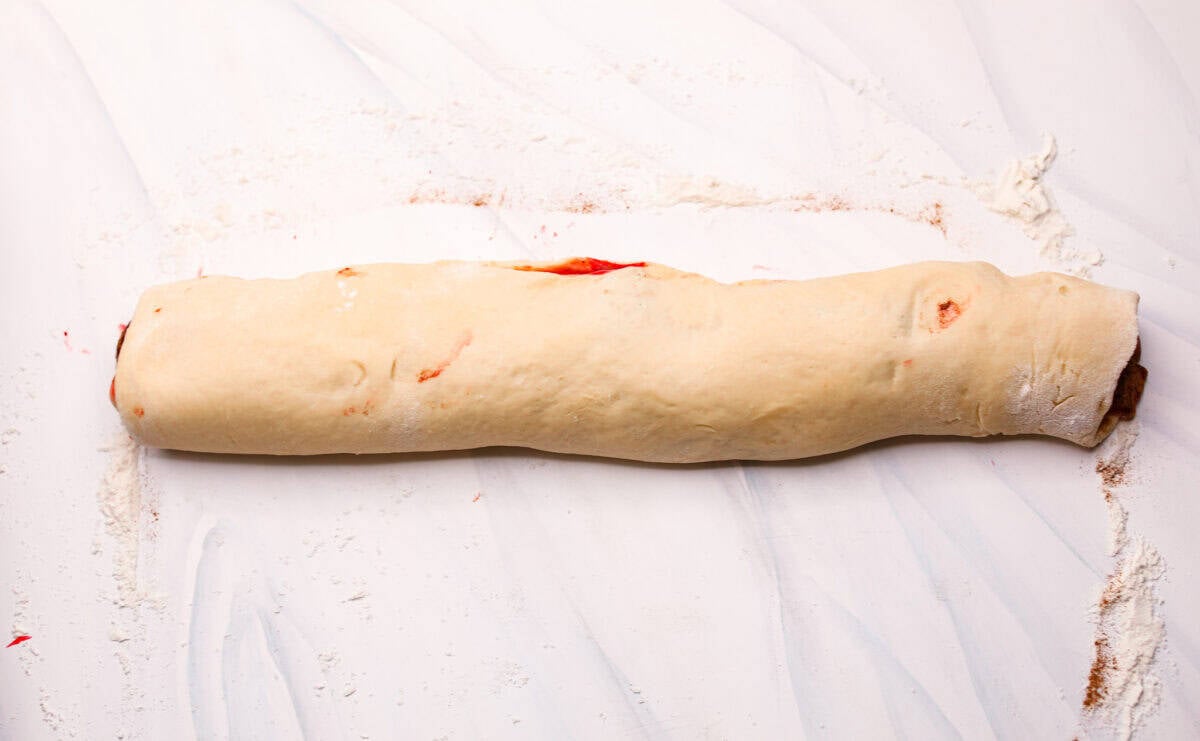 Dough and filling rolled up into a log. 