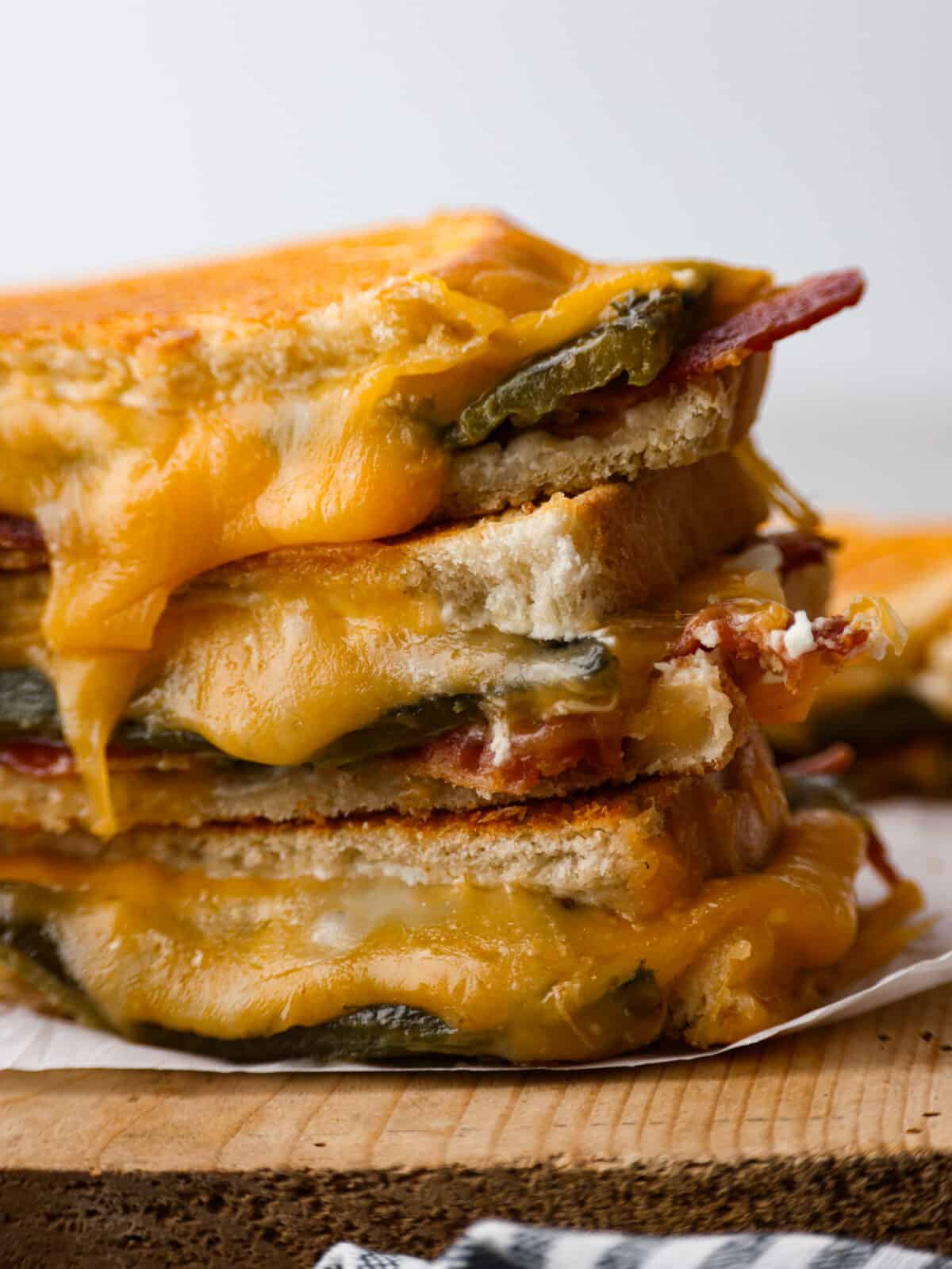 Closeup of jalapeno popper grilled cheese sandwiches.