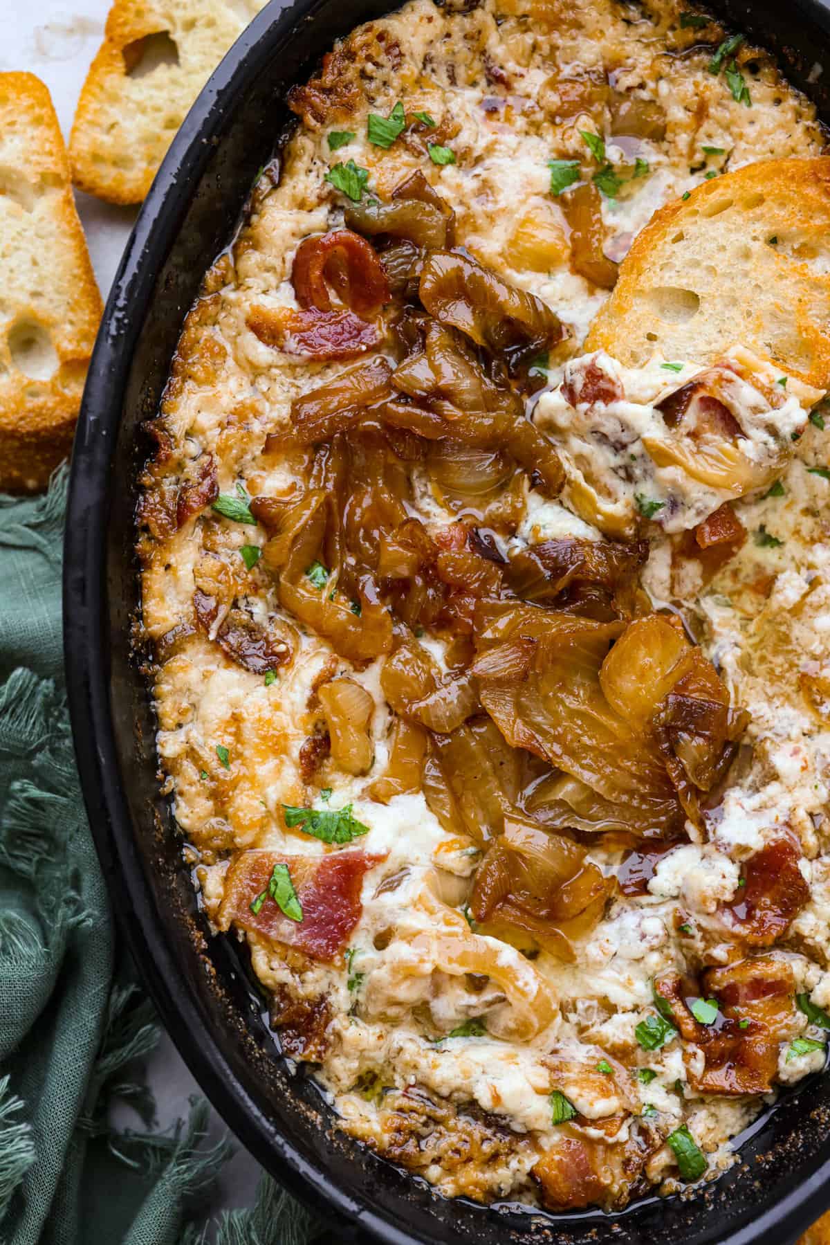 Knowing how to make caramelized onions is one of the best kitchen skills for a home chef to learn! Onions, salted butter and water is all you need to have the most rich, sweet and savory ingredient to bring complex flavor to everything from pizza and pasta to burgers and fajitas. Caramelized onions added to a cheesy dip.
