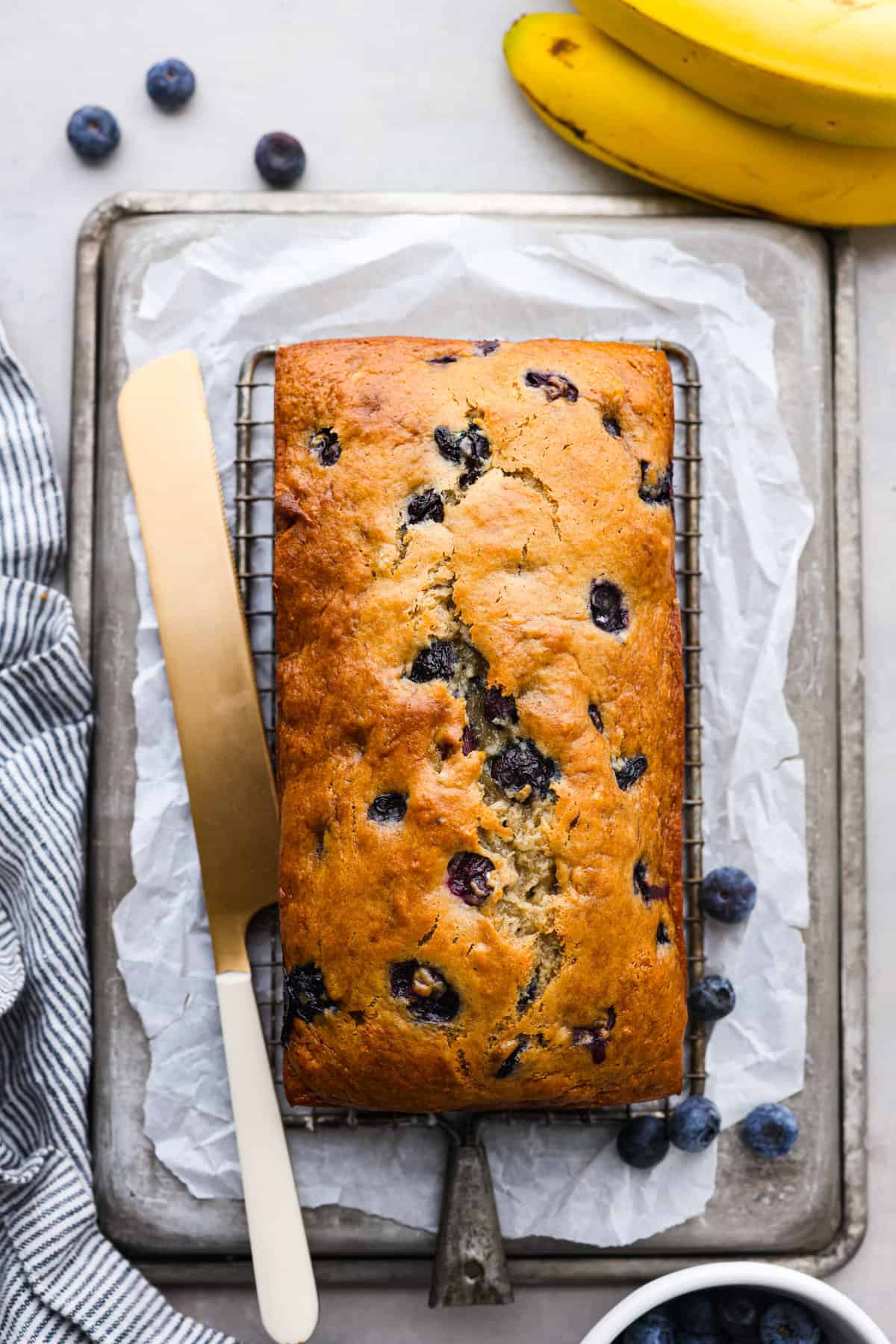 https://therecipecritic.com/wp-content/uploads/2023/11/blueberry-banana-bread-3.jpg