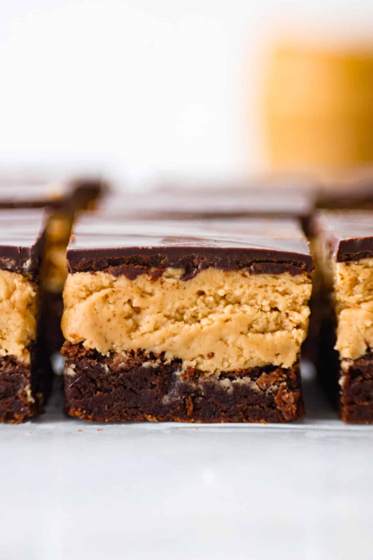 Close view of buckeye brownies showing the three decadent layers.