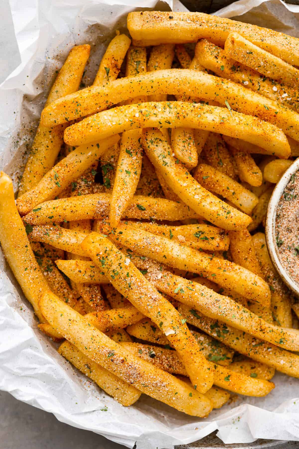 French fries that are seasoned and ready to eat. 