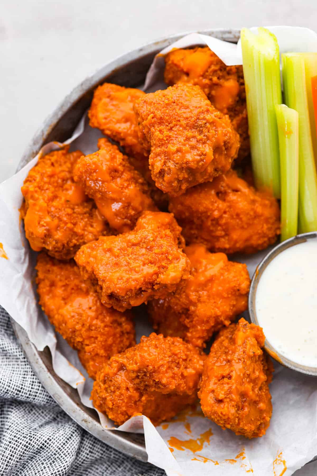 Boneless wings served with celery sticks and ranch.