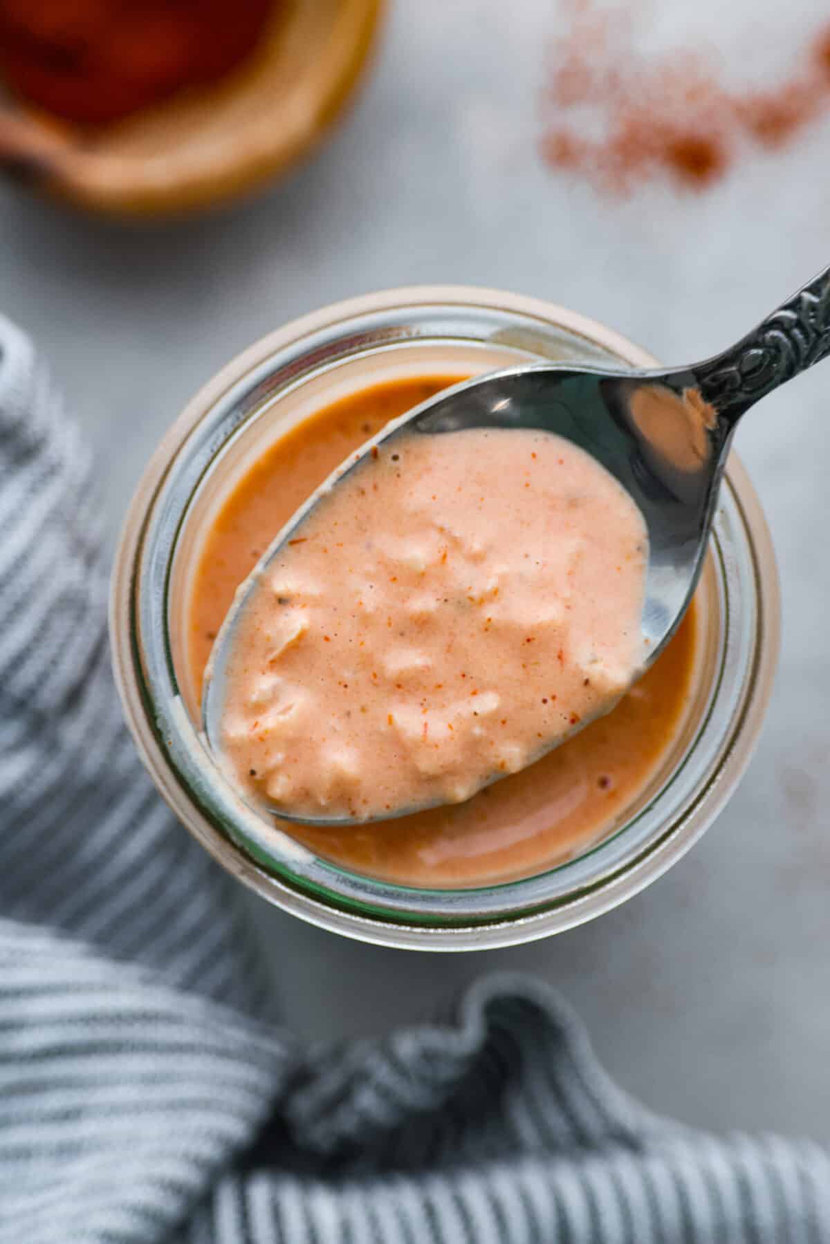 Top-down view of a jar of Russian dressing.