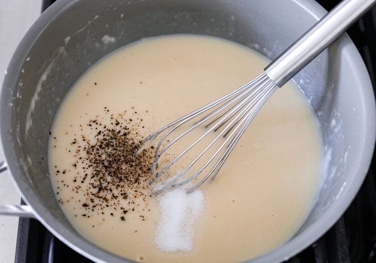 The gravy mixture being whisked together.