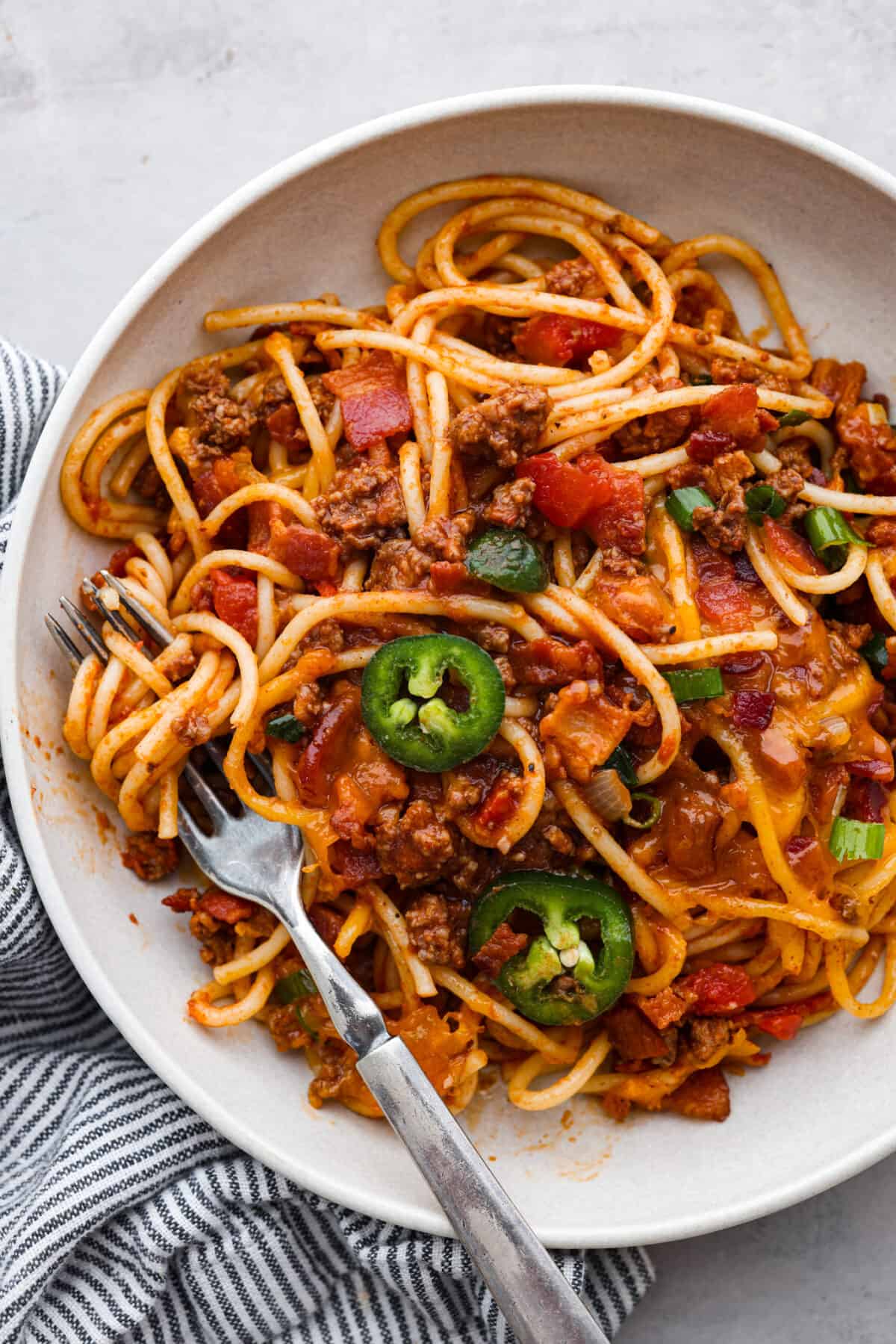 A serving of Cowboy Spaghetti in a white bowl.