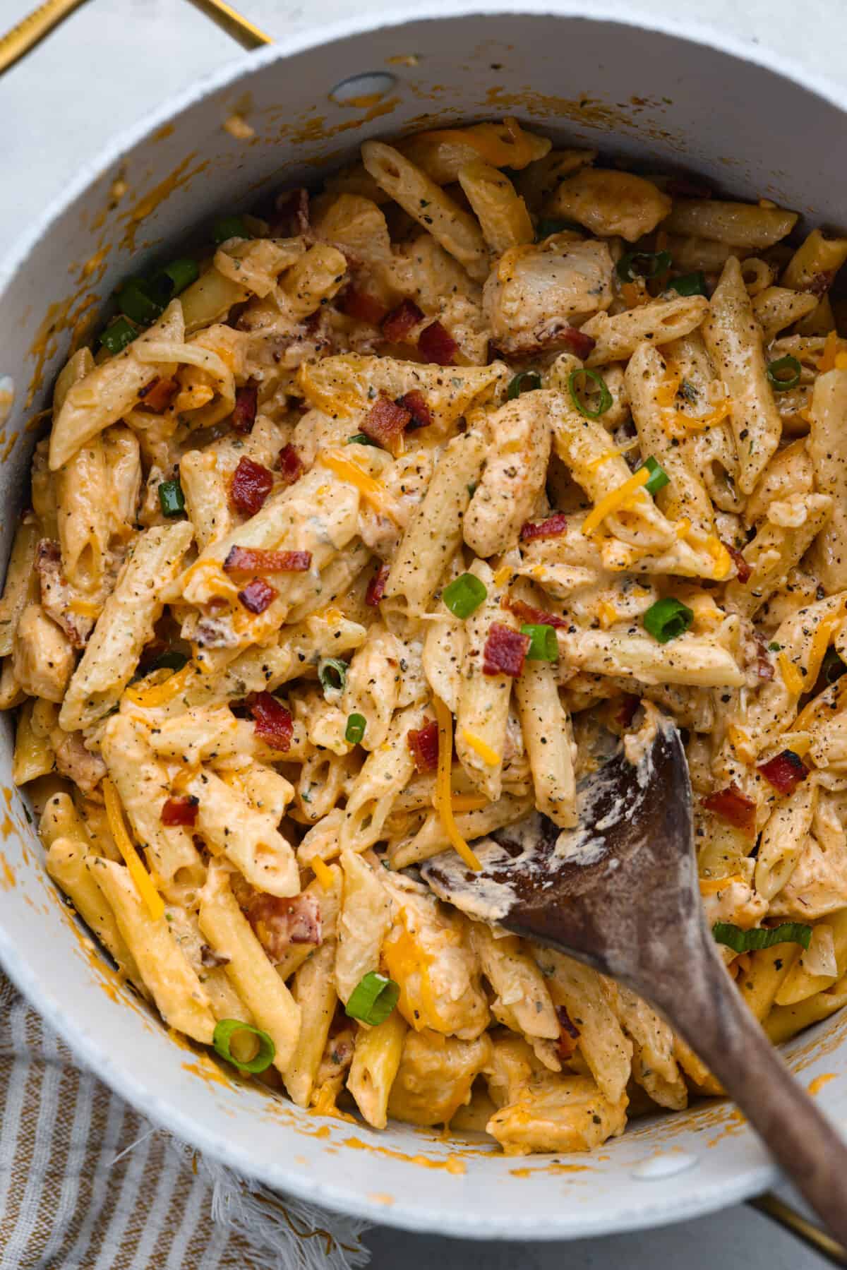 Crack chicken pasta in a large pot.