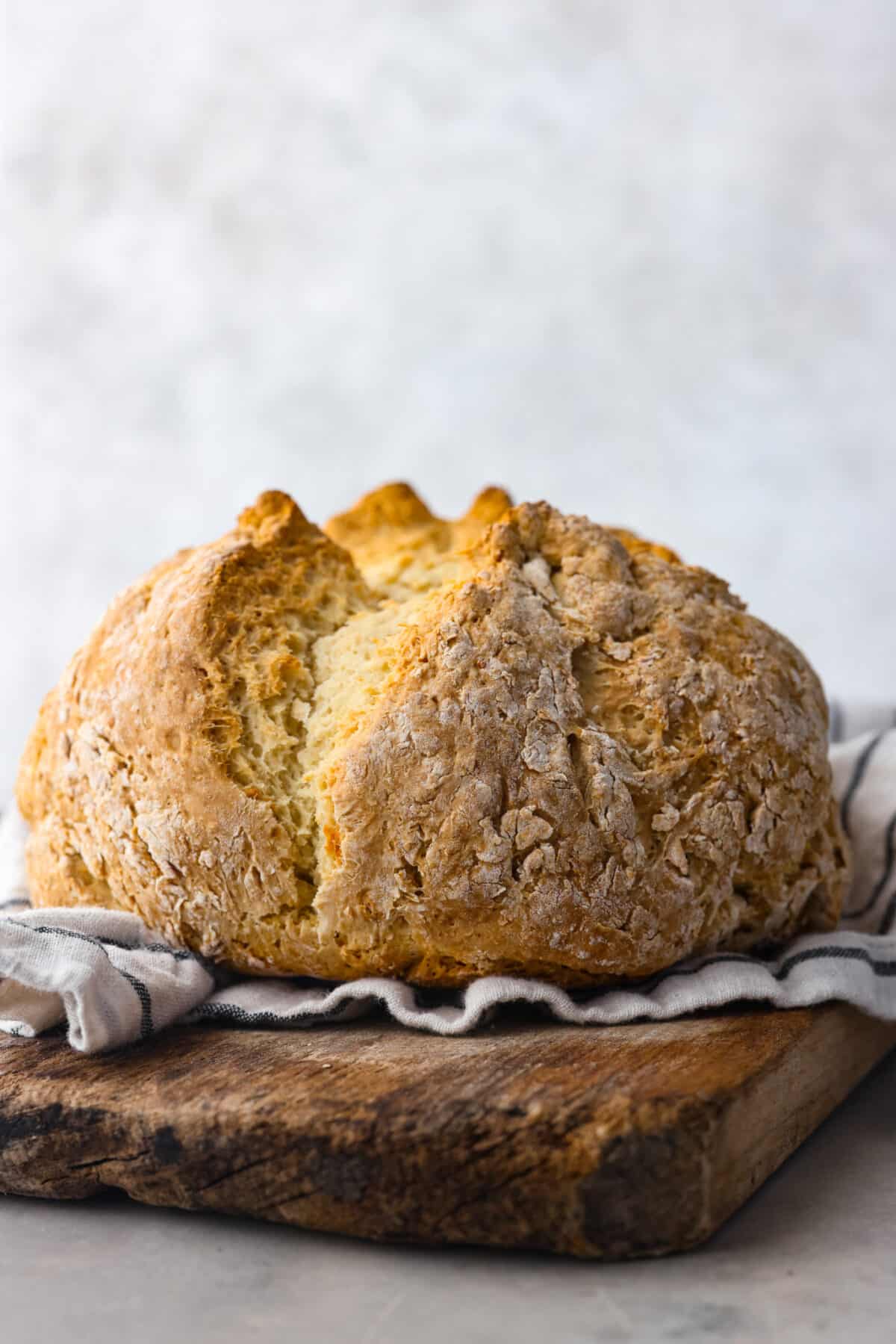 A whole loaf of baked Irish soda bread.