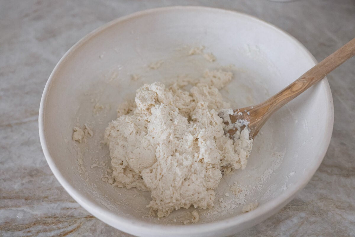 Third photo of the dough formed in a bowl.