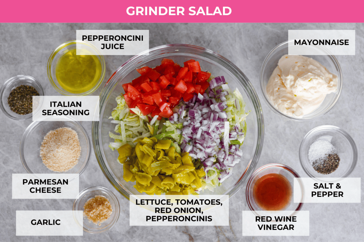All of the ingredients for the grinder salad and dressing separated into glass bowls.