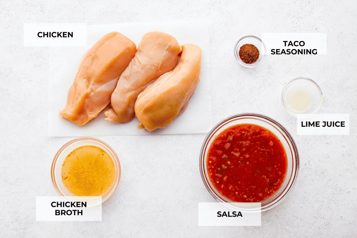 Weeknight dinner made easy with this crockpot salsa chicken! Tender flavorful chicken that only takes 5 ingredients to make. It's a versatile recipe the whole family will love! Ingredients to make salsa chicken labeled.