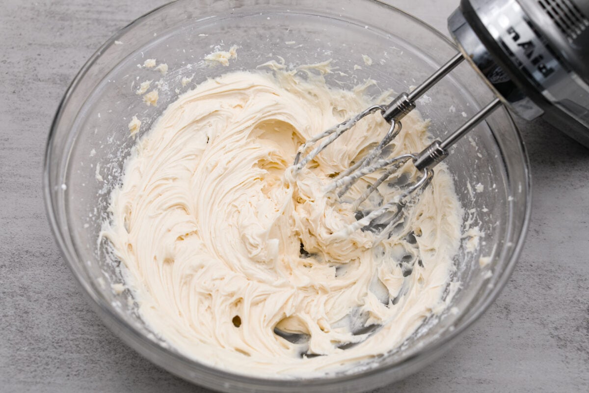 Cream cheese mixture being whipped together.