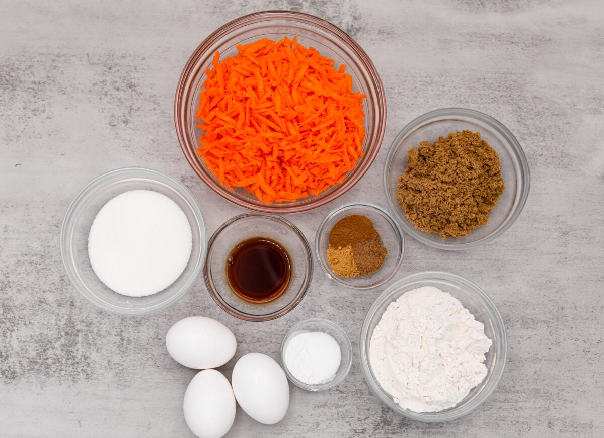 The carrot cake roll ingredients in glass bowls.