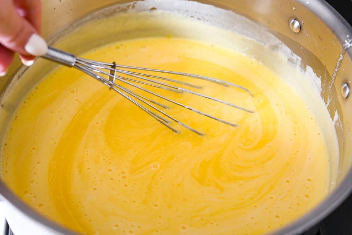 Whisking the egg mixture together.
