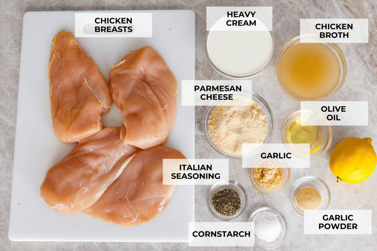 Overhead shot of labeled creamy lemon parmesan chicken ingredients. 