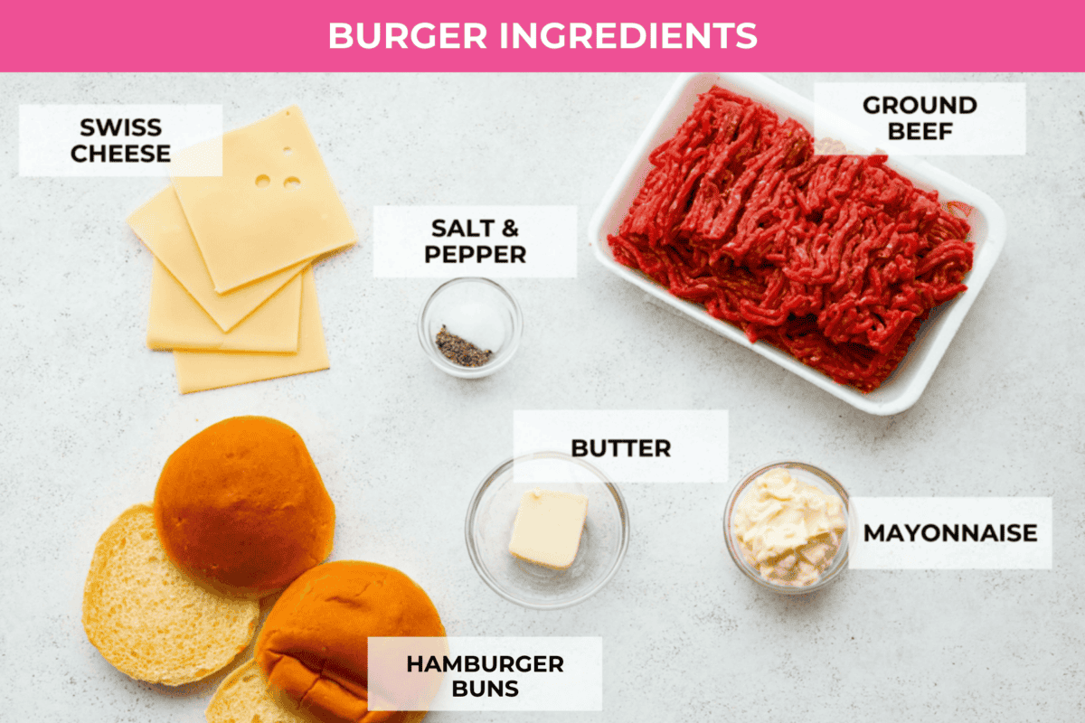 A topview shot of all of the ingredients laid out of a counter for the burger. 