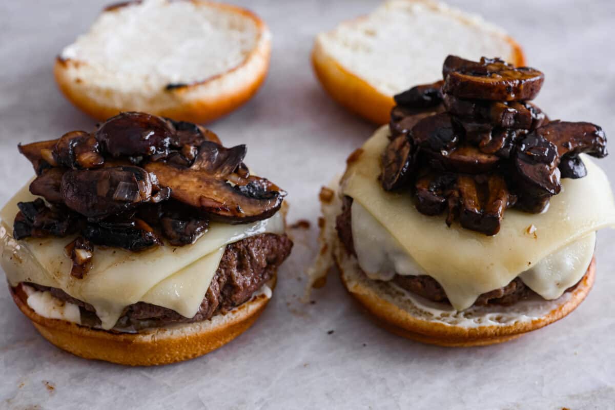 Top the burger with the mushroom mixture. 