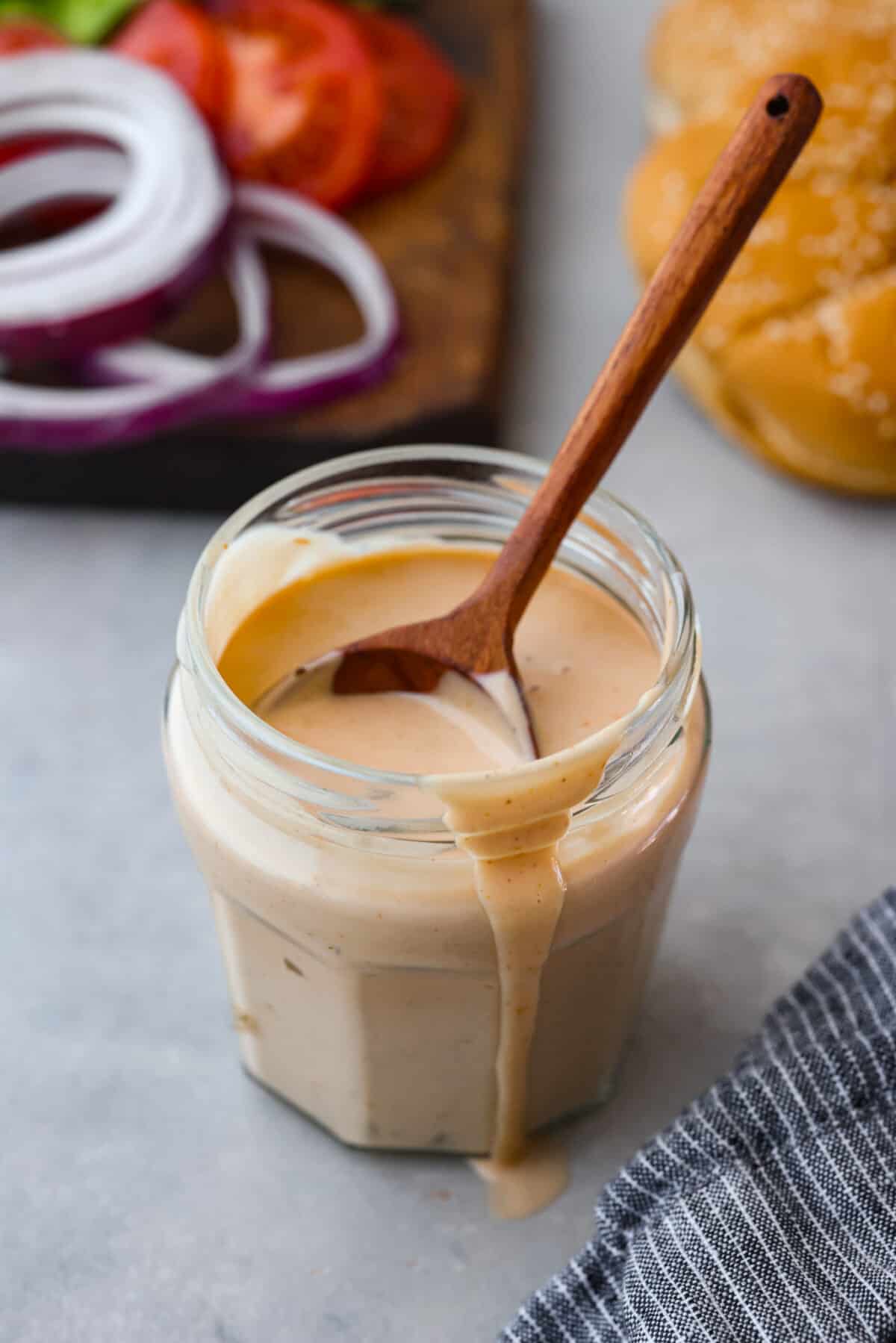 A close up of a jar of burger sauce. 