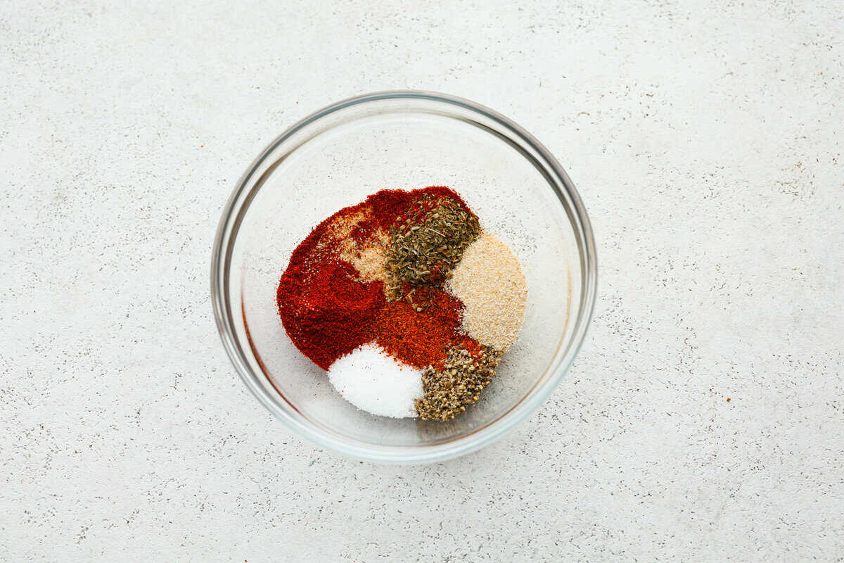 This flavorful Burger Seasoning will take your favorite burger recipe to a new level of delicious! It’s a simple, yet tasty blend of staple spices and seasonings that makes each bite better than the next! Seasonings in a bowl.
