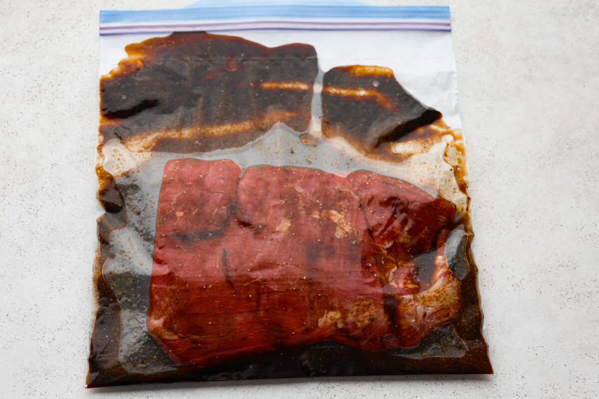 Skirt steak marinating in a plastic bag for the California burritos. 