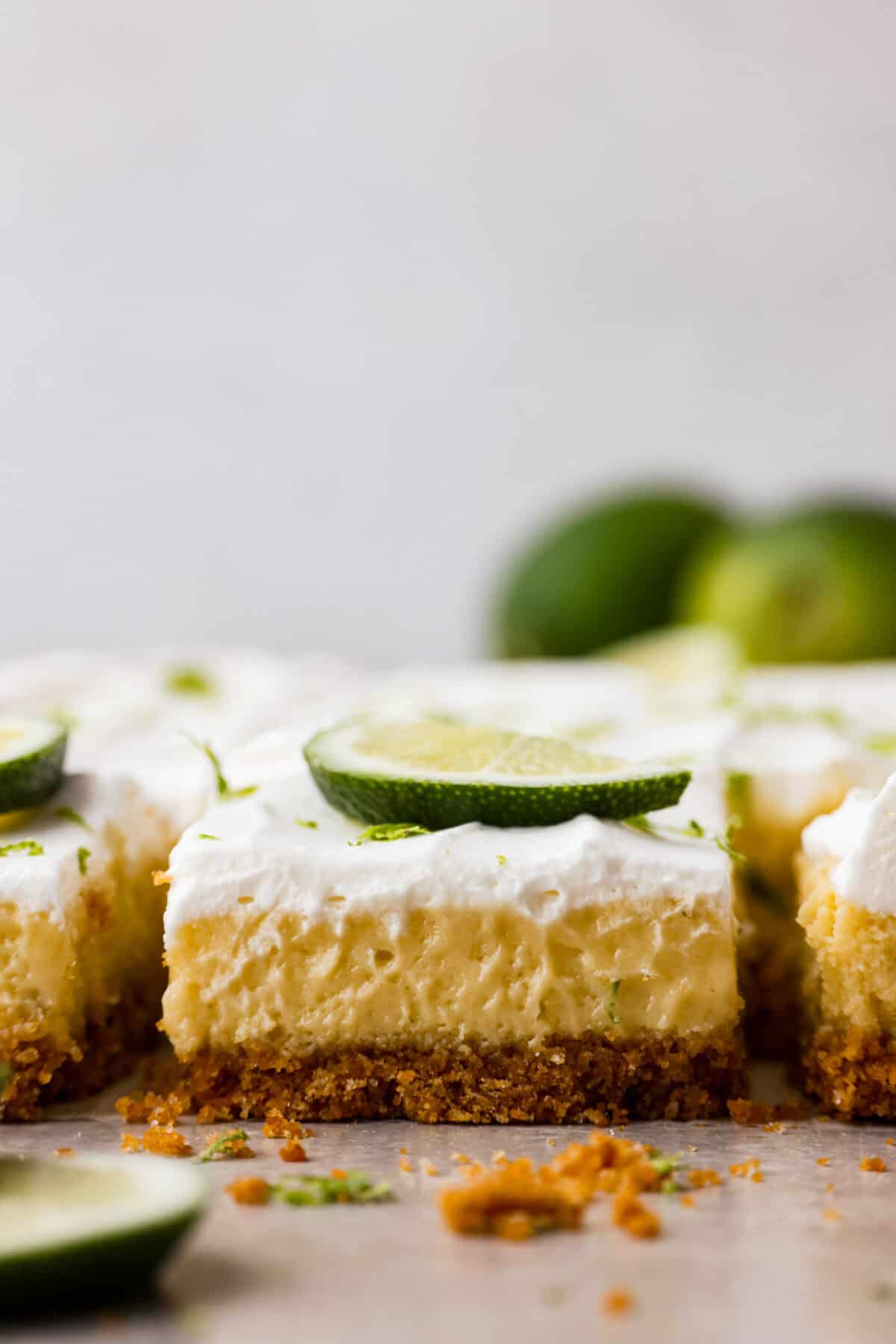 Close side view of key lime pie bars.