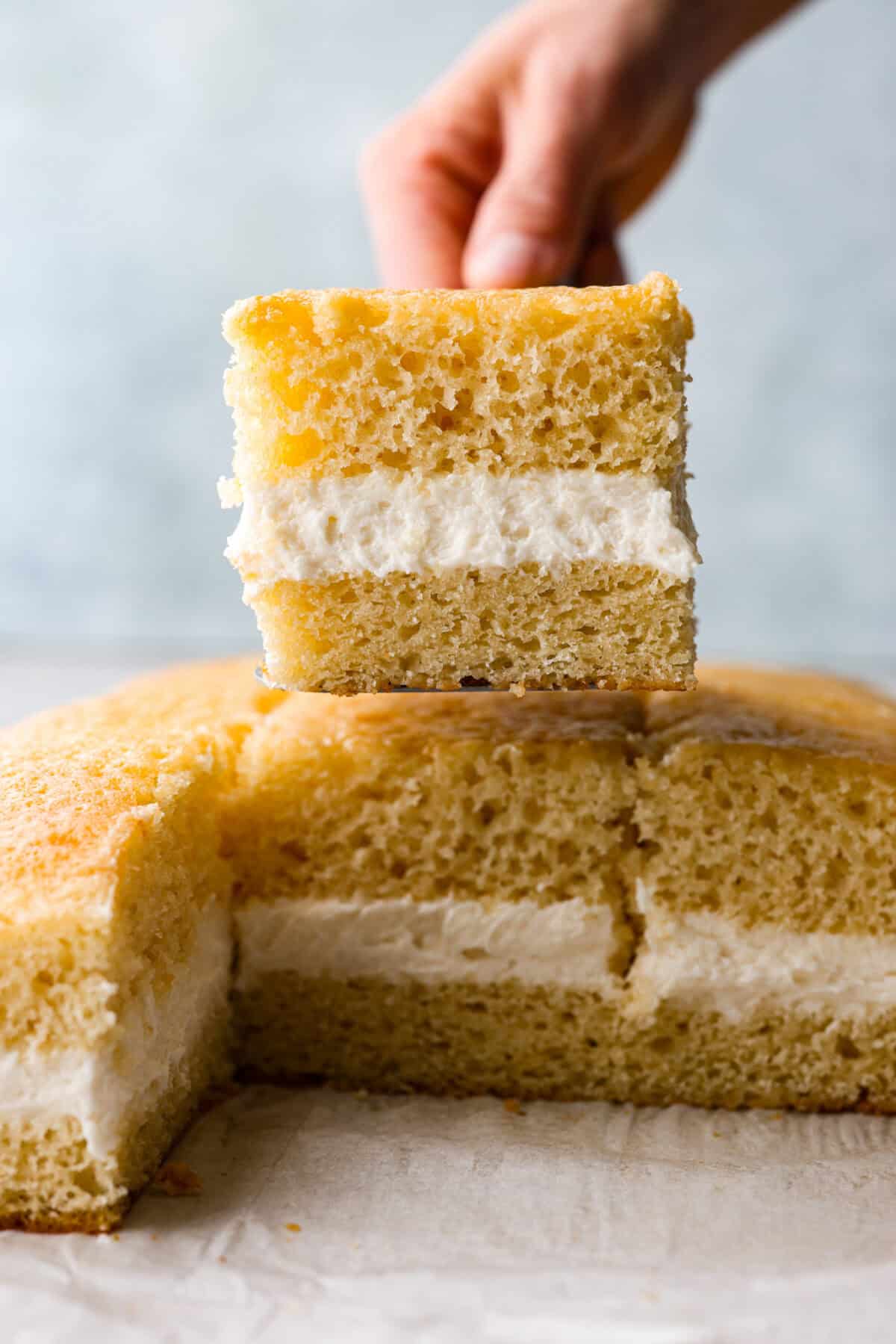 Side view of a slice of Twinkie cake. 