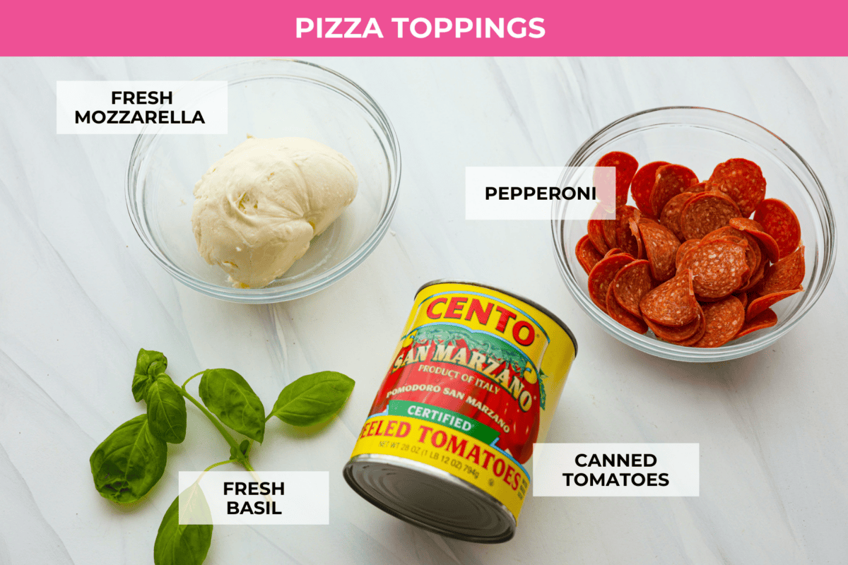 Topping ingredients labeled to make wood-fired pizza.