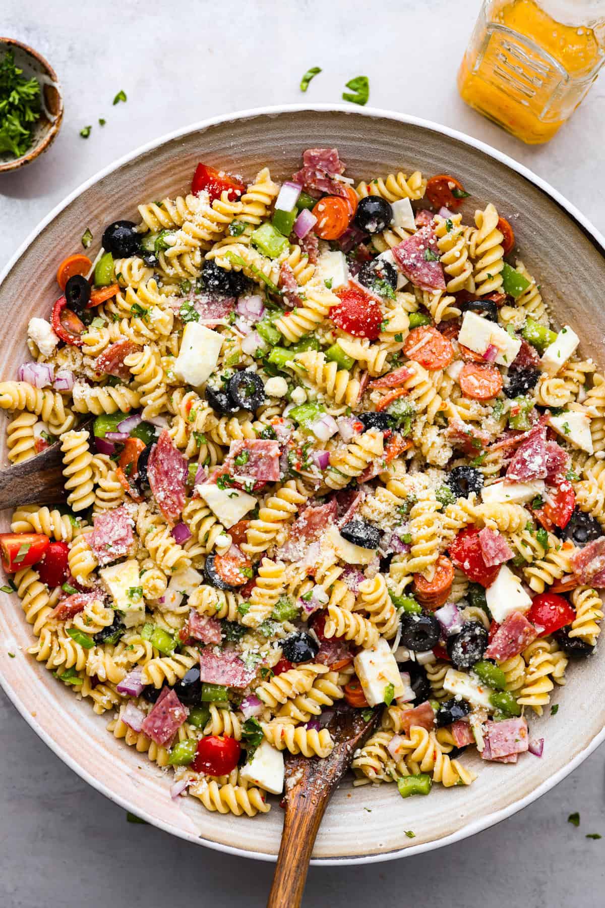 Overhead image of a large bowl with Italian pasta salad