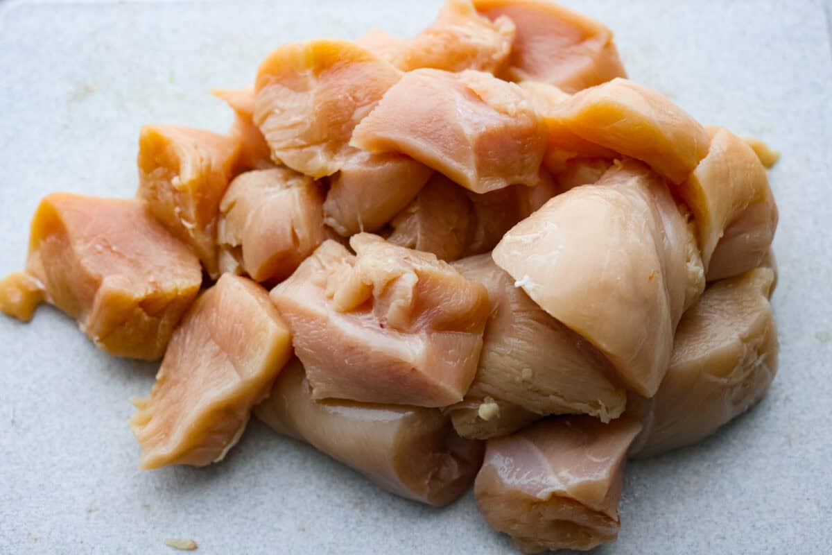 First photo of chicken cut into pieces.