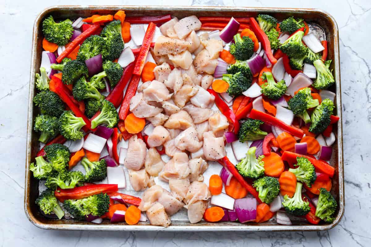 Fourth photo of the vegetables and chicken on the sheet pan.