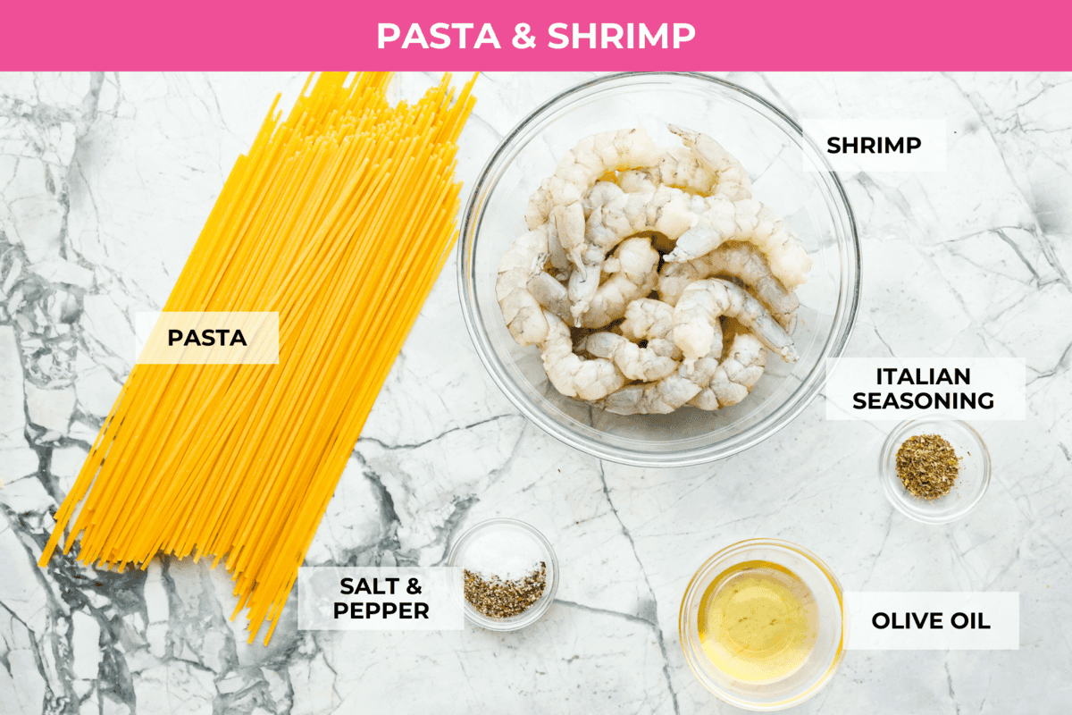 Marry Me Shrimp Pasta dazzles with robust Italian flavors. It's ready in just 30 minutes, and the creamy sauce, brimming with fresh herbs and spices, could very well lead to a marriage proposal after your first bite! Overhead shot of labeled pasta and shrimp ingredients.