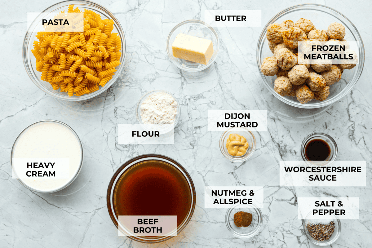 Swedish Meatball Casserole is a classic comfort meal the whole family will enjoy! Tender meatballs are layered over perfectly cooked pasta and baked in a rich, creamy gravy. This dinner recipe is easy enough to make during the week but also deliciously impressive for entertaining! Overhead shot of labeled ingredients.