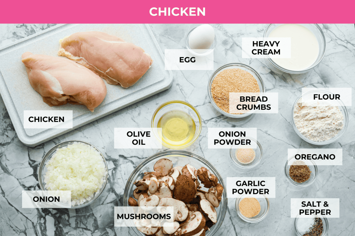 Smothered chicken is a flavorful comfort food full of rich, creamy gravy, tender chicken cutlets, and savory mushrooms. Perfect on its own or paired with mashed potatoes, rice or pasta, you're family will definitely want this on the weekly meal plan. Overhead shot of labeled chicken ingredients.