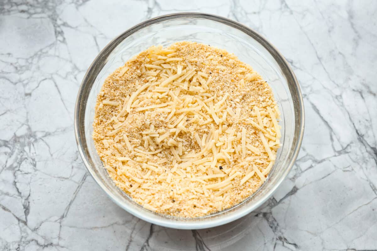 Overhead shot of crumb topping ingredients mixed in a bowl. 