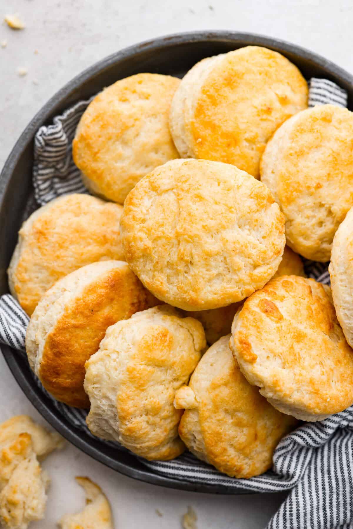 Overhead shot of cream cheese biscuits on a plate. 