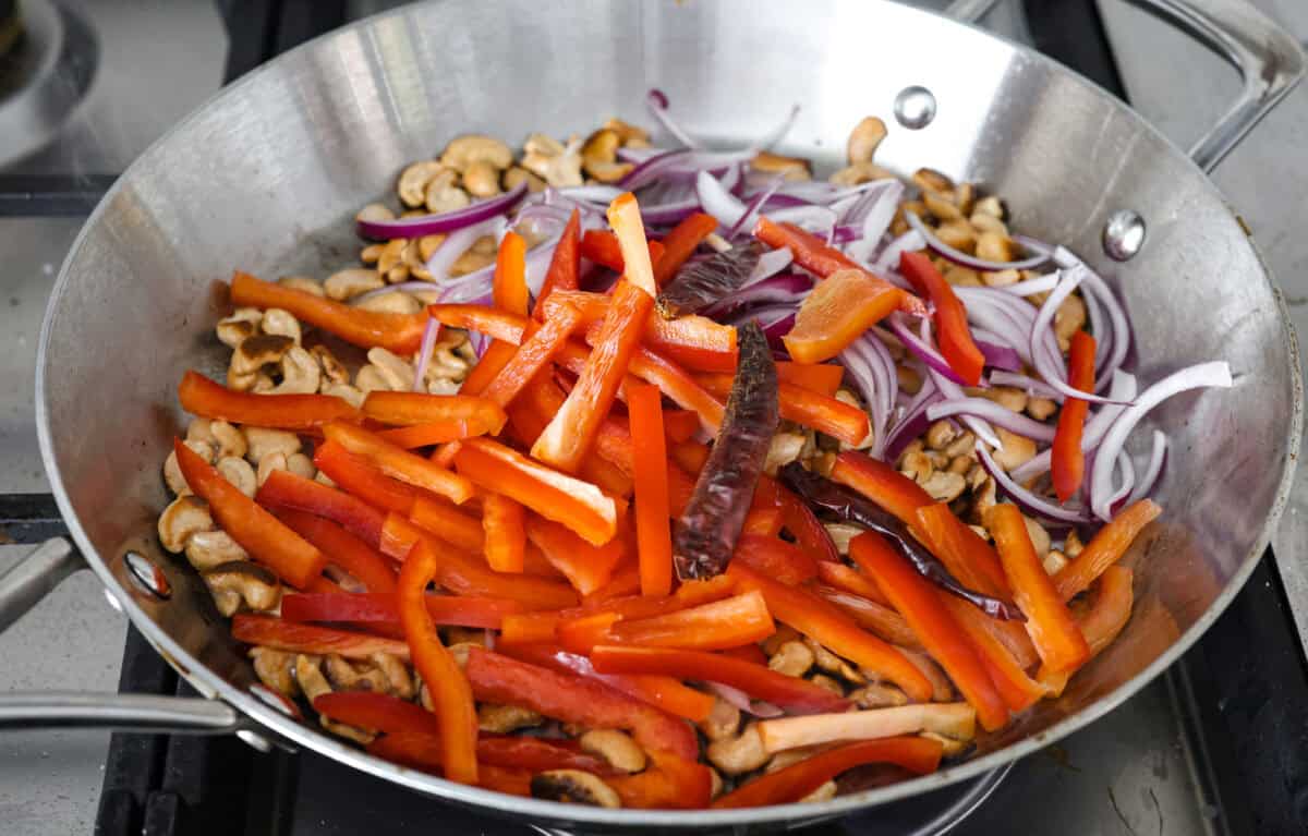 Angle shot of stir fry ingredients in a wok. 