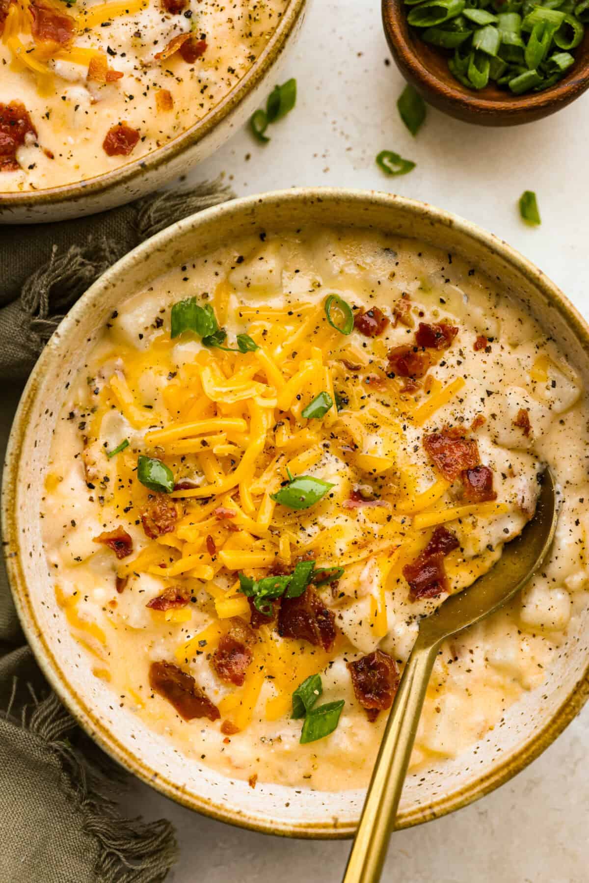 The photo above is a layered crock pot cracked potato soup in a bowl. 