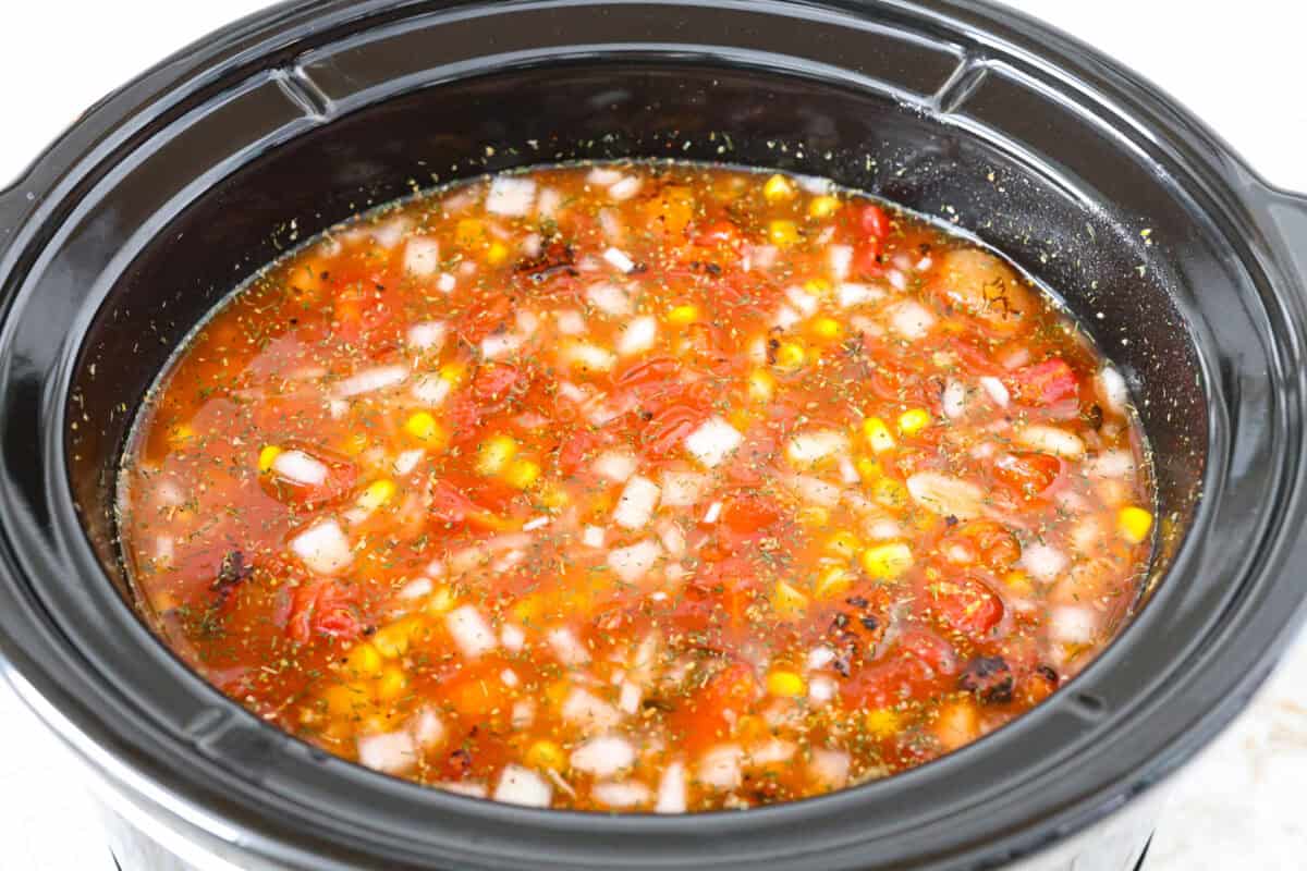 Top shot of all the ingredients stirring in the crockpot. 