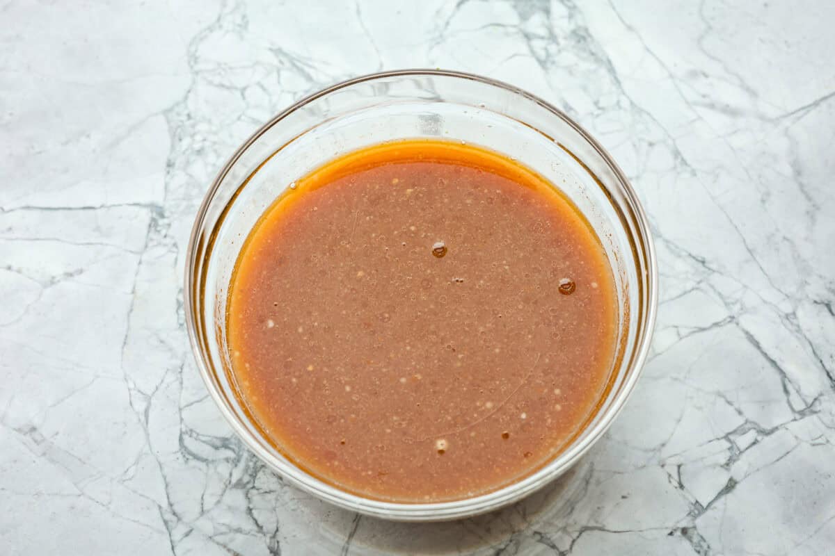 The above sauces are mixed together in a glass bowl. 