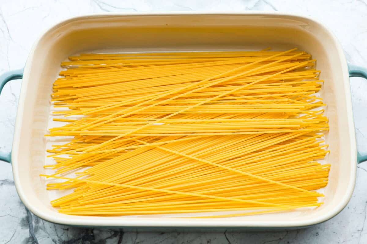 Shoot the noodles from above at the bottom of the pan. 