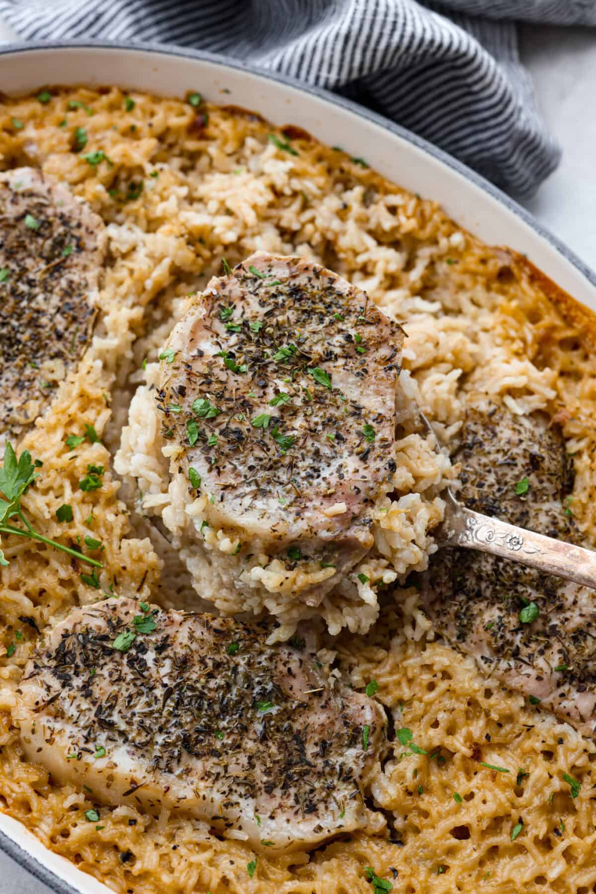 Close up shot of no peek pork chops and rice. 